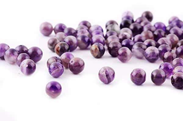 Plongez dans le monde fascinant des perles d'améthyste 10 mm : guide d'avis complet, caractéristiques distinctives et conseils d'achat pour embellir vos créations bijoux.